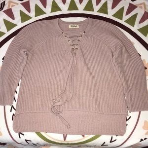 Boutique lace up style sweater